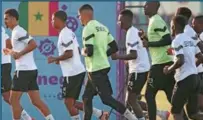  ?? (AFP) ?? Senagal’s players jog during a training session at Duhail Handball Sports Hall on Monday.