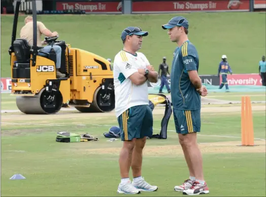  ?? GALLO IMAGES ?? BRAINS TRUST: Proteas coach Russell Domingo and ODI captain AB de Villiers discuss tactics and ways to roll over Pakistan ahead of the third and final one-day internatio­nal at Centurion today. SA have already lost the series 2-0.