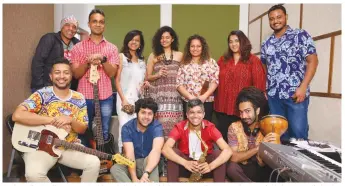  ?? — ASIAN AGE ?? Keyboardis­t Merlin DSouza (3rd from left, above) with her group. The Manganiyar musical classroom (below), which features kids from 8 to 12.