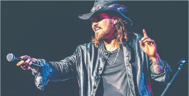  ?? POSTMEDIA NEWS FILES ?? Billy Ray Cyrus performs in Toronto pre-pandemic.