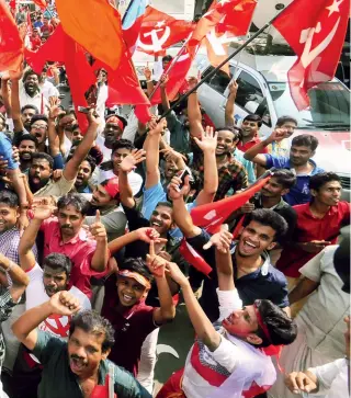  ??  ?? RED BETTER THAN ORANGE? LDF candidate M.B. Faisal (with garland) on the last day of the campaign