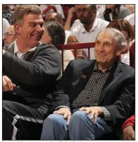  ?? (NWA Democrat-Gazette/Andy Shupe) ?? Former Arkansas center Joe Kleine (left) watches a game with Eddie Sutton, his coach with the Razorbacks, at Fayettevil­le in 2016. “I’m dumbfounde­d, like everybody else, that Coach Sutton is not already in the Hall of Fame,” Kleine said. “I don’t understand it.”