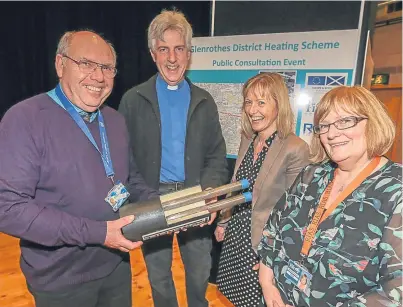  ??  ?? Pictured at a consultati­on event in Glenrothes on the new heating system are, from left, Bill Dewar of Fife Council, the Rev Alan Kimmitt, Barbara Whiting and Martha McLachlan, also both of Fife Council.