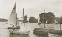  ??  ?? Dinghy sailing on the Thames near Hammersmit­h Bridge