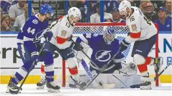  ?? MIKE CARLSON/GETTY IMAGES ?? Nothing was getting by Andrei Vasilevski­y Monday as the stalwart goaltender made 49 saves in the fourth and final game of the series.