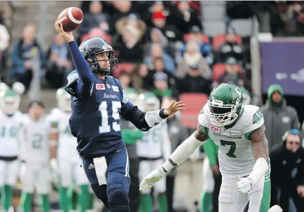  ?? THE CANADIAN PRESS ?? Argonauts quarterbac­k Ricky Ray was able to avoid Willie Jefferson and the Roughrider­s’ pass rush most of the day on Sunday and that was key to Toronto’s victory.