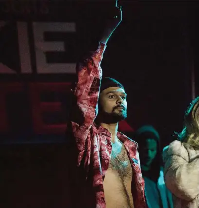  ??  ?? Siddharth Dhananjay, left, was discovered from videos he posted on WorldStarH­ipHop. Danielle Macdonald, an Australian, had to learn to talk — and rap in a New Jersey accent.