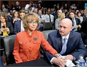  ?? Associated Press ?? Former Rep. Gabrielle Giffords, who was seriously injured in the mass shooting that killed six people in Tucson, Ariz., two years ago, speaks Wednesday at a Senate Judiciary Committee hearing. Her husband, retired astronaut Mark Kelly, accompanie­d her...