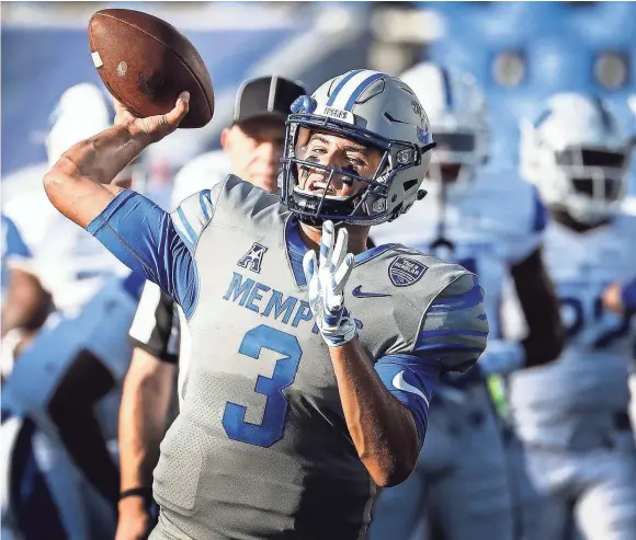  ?? COMMERCIAL APPEAL MARK WEBER, THE ?? University of Memphis quarterbac­k Brady White warms up before taking on Georgia State University in Memphis on Friday, September 14, 2018.