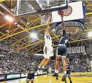  ?? Catherine Avalone / Hearst Connecticu­t Media ?? Hillhouse beat Notre Dame-West Haven to win the 2017 SCC boys basketball championsh­ip in front of a sold-out crowd at TD Bank Sports Center at Quinnipiac University in Hamden.