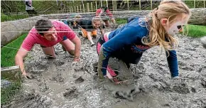  ?? WARWICK SMITH/STUFF ?? The Mudder is an obstacle course on sodden farmland near Marton.