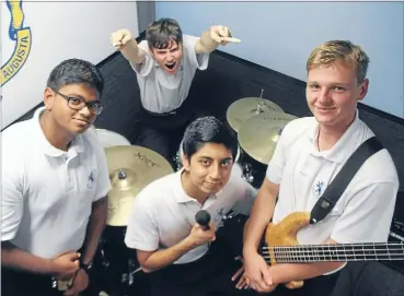  ??  ?? Mount Albert Grammar School rock band Apollo. From left, guitarist James Venkatrao, drummer Connor Stockman, guitarist-vocalist Biku Adhikari and bassist James Luff.