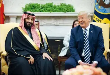  ??  ?? Mohamed bin Salman bénéficie du soutien personnel du président américain, Donald Trump, qui le reçoit à Washington le 20 mars 2018.