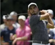  ?? NICK WASS — THE ASSOCIATED PRESS ?? Abraham Ancer, of Mexico, watches his shot on the third tee during the third round of the Quicken Loans National golf tournament, Saturday in Potomac, Md.