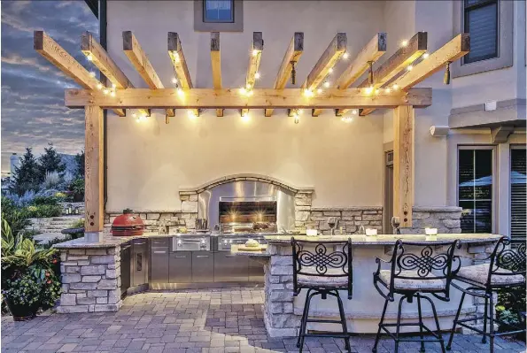  ??  ?? Outdoor kitchens are becoming an increasing­ly popular option for entertaini­ng, says Ernie Lussier, owner of Calgary-based Canada Outdoor Kitchens.