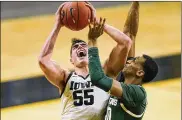  ?? ASSOCIATED PRESS ?? Center Luka Garza, a 6-foot-11, 265-pound senior, led the Iowa Hawkeyes to a No. 2 seed in the NCAA Tournament, then accounted for 36 of their 80 points in a secondroun­d upset loss to Oregon State.