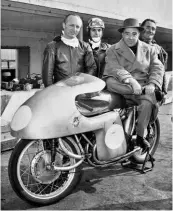  ??  ?? Left: The Count seated on the 1955 MV 500 four with Earles fork and intermedia­te streamlini­ng, with MV team manager Nello Pagani (left), rider Umberto Masetti (centre) and Carlo Bandirola