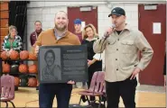  ?? PHOTOS BY CHARLES PLEINESS — FOR MEDIANEWS GROUP ?? Justin Thomas speaks to the audience at a ceremony naming the Hazel Park High School basketball court in his dad’s honor. Cody Thomas is on the left.