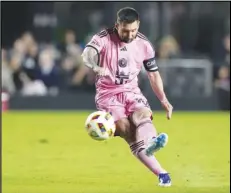  ?? Associated Press ?? Inter Miami forward Lionel Messi takes a free kick during the first half of the team's MLS soccer match against Real Salt Lake, Wednesday, in Fort Lauderdale, Fla.