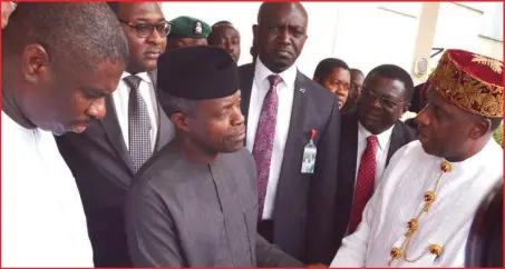  ??  ?? Vice-President Yemi Osinbajo (centre), being welcomed by the Director General of the Nigerian Maritime Administra­tion and Safety Agency (NIMASA), Dr. Dakuku Peterside (left), and the Minister of Transporta­tion, Mr. Rotimi Amaechi (right), to the launch...