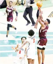  ??  ?? Mississipp­i State guard D.J. Stewart (3) takes the goahead shot as Richmond guards Jacob Gilyard (0) and Blake Francis (1) defend on Thursday night in Denton, Texas. (Photo by Ron Jenkins, AP)