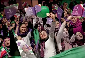  ?? AFP ?? Supporters of Iranian president and candidate in the upcoming presidenti­al elections, Hasan Rohani, attend a campaign rally in the northweste­rn city of Ardabil on Wednesday. —