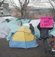  ?? CHAD HIPOLITO / THE CANADIAN PRESS ?? One member of Mad As Hell says the “poverty industry”
in Victoria maintains its strength through thuggery.