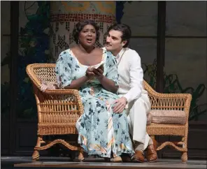  ?? (Special to the Democrat-Gazette/Karen Almond, Metropolit­an Opera) ?? Angel Blue sings the role of Magda with Jonathan Tetelman as Ruggero in Puccini’s “La Rondine” at the Metropolit­an Opera.