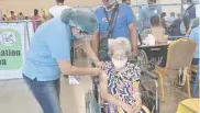  ?? @ILOILOCITY­GOV ?? A SENIOR citizen gets vaccinated at the Iloilo Convention Center in this photo posted July 12.