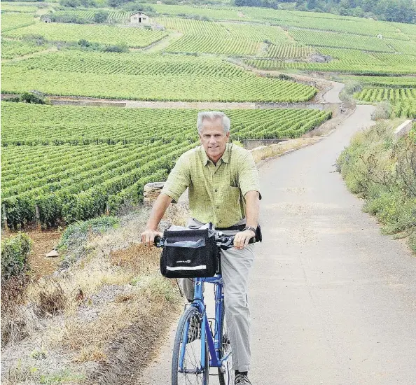  ?? RICK STEVES ?? Cycling between wineries can make for a pleasant and leisurely outing among the world famous vineyards of Burgundy’s Côte d’Or.