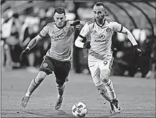  ?? [JAY LAPRETE/THE ASSOCIATED PRESS] ?? The Crew’s Justin Meram, right, said he expects a sellout crowd Tuesday to create the same atmosphere as in the team’s 2015 MLS Cup appearance. When: Where: TV: Radio: Regular-season records: Projected starters: