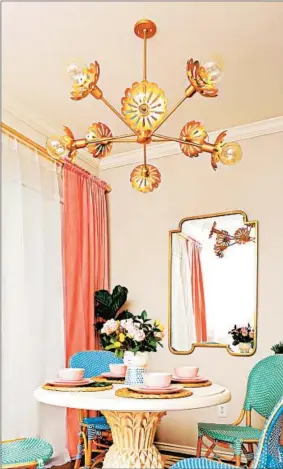  ?? FRED MOSER/KELLY GOLIGHTLY/MITZI ?? The Alyssa Chandelier by Mitzi seems to have been inspired by a blooming bouquet.