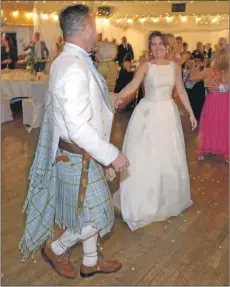  ?? 25_c13irving3­5 ?? The first dance as Skipinnish play Billy’s song First Dance.