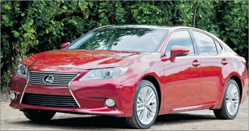  ?? ZACK SPENCER PHOTOS/ SPECIAL TO THE SUN ?? The revved- up 2013 Lexus ES design features a more aggressive and stylish look. The grille has been updated and the edges of the car are more angular.