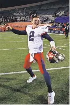  ?? WADE PAYNE/ AP ?? Johnny Manziel celebrates during his brief stint with the Memphis Express in the now- defunct AAF.