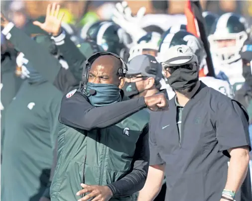  ?? Carlos Osorio, The Associated Press ?? Michigan State head coach Mel Tucker pumps his fist after the team defeated Michigan 27- 24 on Saturday.