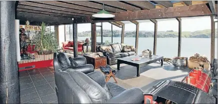  ??  ?? Perfect situation: The Welch home is built on the edge of a cliff overlookin­g the Pauatahanu­i Inlet. Gloria says it’s a perfect site and few disagree.