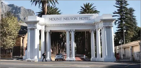  ?? PHOTOS: JASON BOUD AND AP ?? The Mount Nelson Hotel in Cape Town, above, and the Michelange­lo Hotel in Sandton, right. Cape Town remained the gem of the SA hotel sector despite the water shortage.