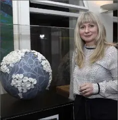  ??  ?? Bernadette Doolan and her globe.
