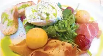  ??  ?? Burrata and prosciutto crudo salad with toasted grapes and melon balls from Café Tiramisu on Belden Place