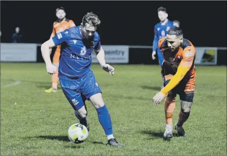  ?? Pic: Martyn White ?? FLASHBACK Baffins Milton Rovers (blue) take on AFC Portcheste­r in a Wessex League Premier game in December. There won’t be an Invitation­al Cup repeat after lockdown as Rovers have turned down the chance to be involved