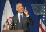  ?? STEPHEN HAAS — THE NEWS-GAZETTE VIA AP ?? Former President Barack Obama speaks in Foellinger Auditorium on the University of Illinois campus in Urbana, Ill., on Friday.