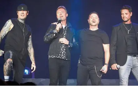  ??  ?? The Irish boyband – (from left) Lynch, Keating, Graham and Duffy – spent 90 minutes serenading fans with songs from the 1990s as well as tracks from its upcoming final album. — Photos: CHAN TAK KONG/The Star