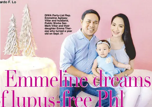  ??  ?? DIWA Party-List Rep. Emmeline AglipayVil­lar and husband, Public Works Sec. Mark Villar and their daughter Emma Therese who turned a year old on Sept. 21