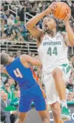  ?? | GETTY IMAGES ?? Michigan State’s NickWard goes in for a layup Sunday against Savannah State.