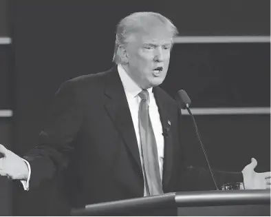  ?? DAVID GOLDMAN / THE ASSOCIATED PRESS FILES ?? Donald Trump answers a question during the first presidenti­al debate on Sept. 26.