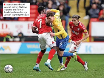  ?? ?? Nathan Broadhead (centre) battles Diallang Jaiyesimi and former Sunderland man George Dobson (right) for the ball