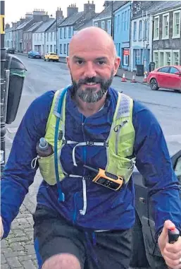  ??  ?? Dr Mark Calder will complete his fundraisin­g mission with a 114km run from Edinburgh Castle to St Andrews Cathedral.