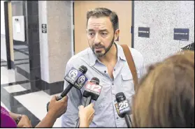  ??  ?? Radley Horwitz, 43, speaks to members of the media Tuesday outside court after his mother, Donna, was convicted of shooting his father to death while he showered at his Admirals Cove house.