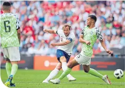  ??  ?? Harry Kane scores against Nigeria. England fans would love a repeat against Tunisia tomorrow night